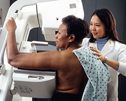 Photo: Woman having breast scan